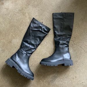 Knee high Chelsea boots